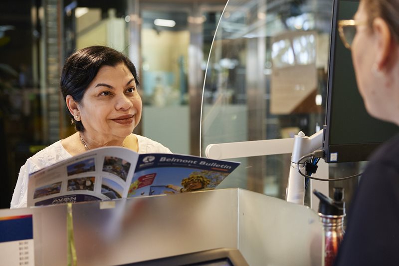 Woman reading a magazine.