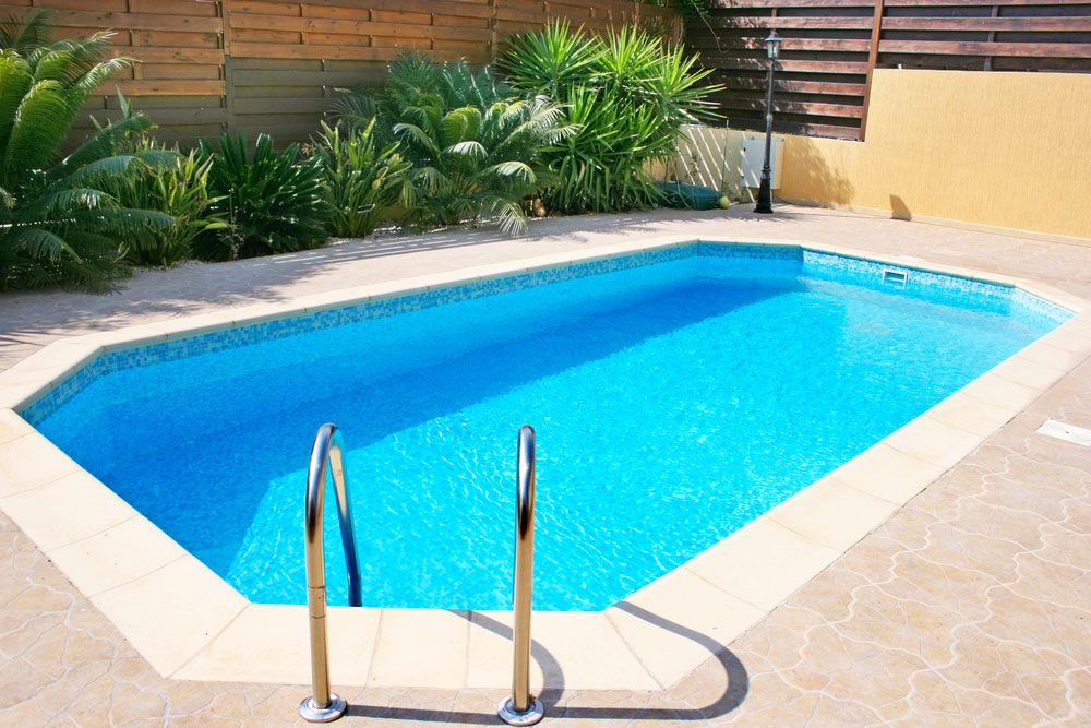 Clear blue residential swimming pool.