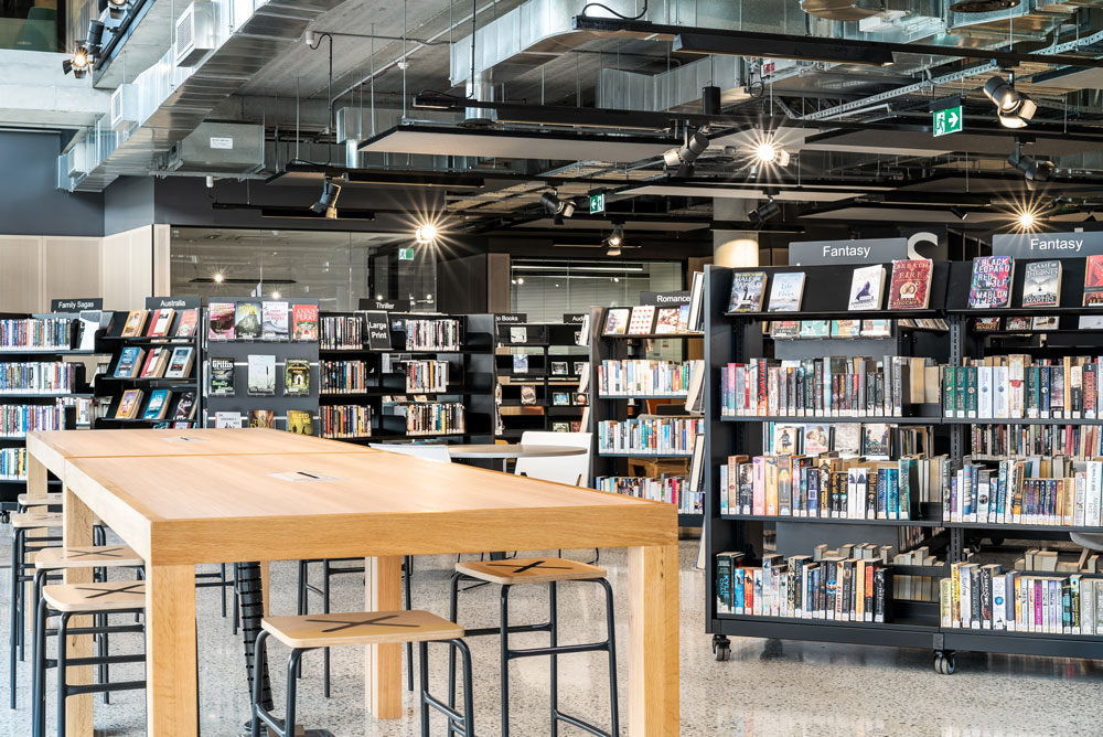 Library ground floor with table and books