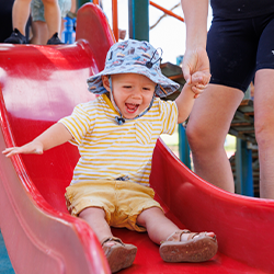 Child going down a slide