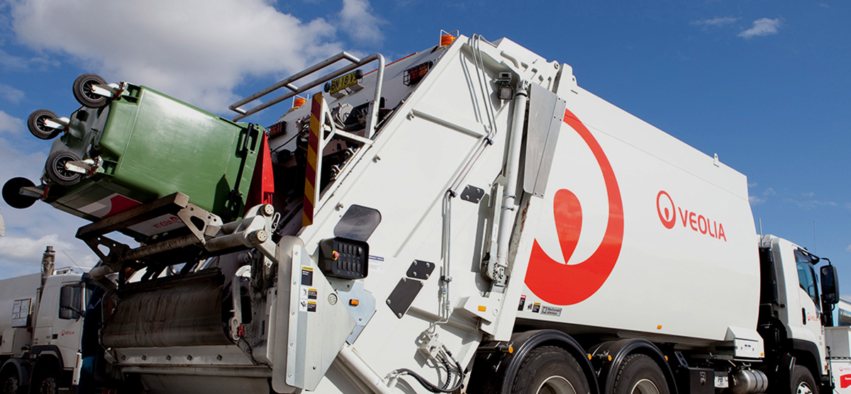 Veolia branded Waste Truck collecting kerbside bins