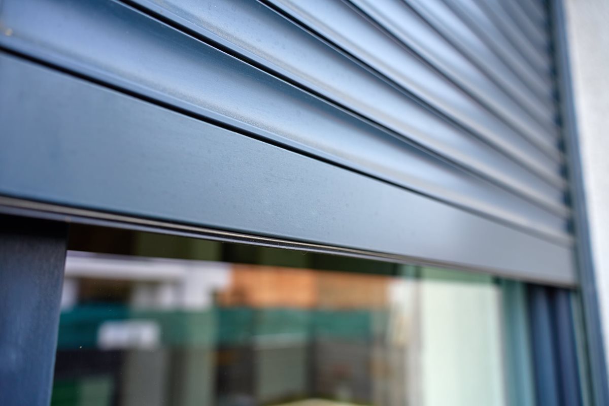 Close up image of a grey rollar shutter 