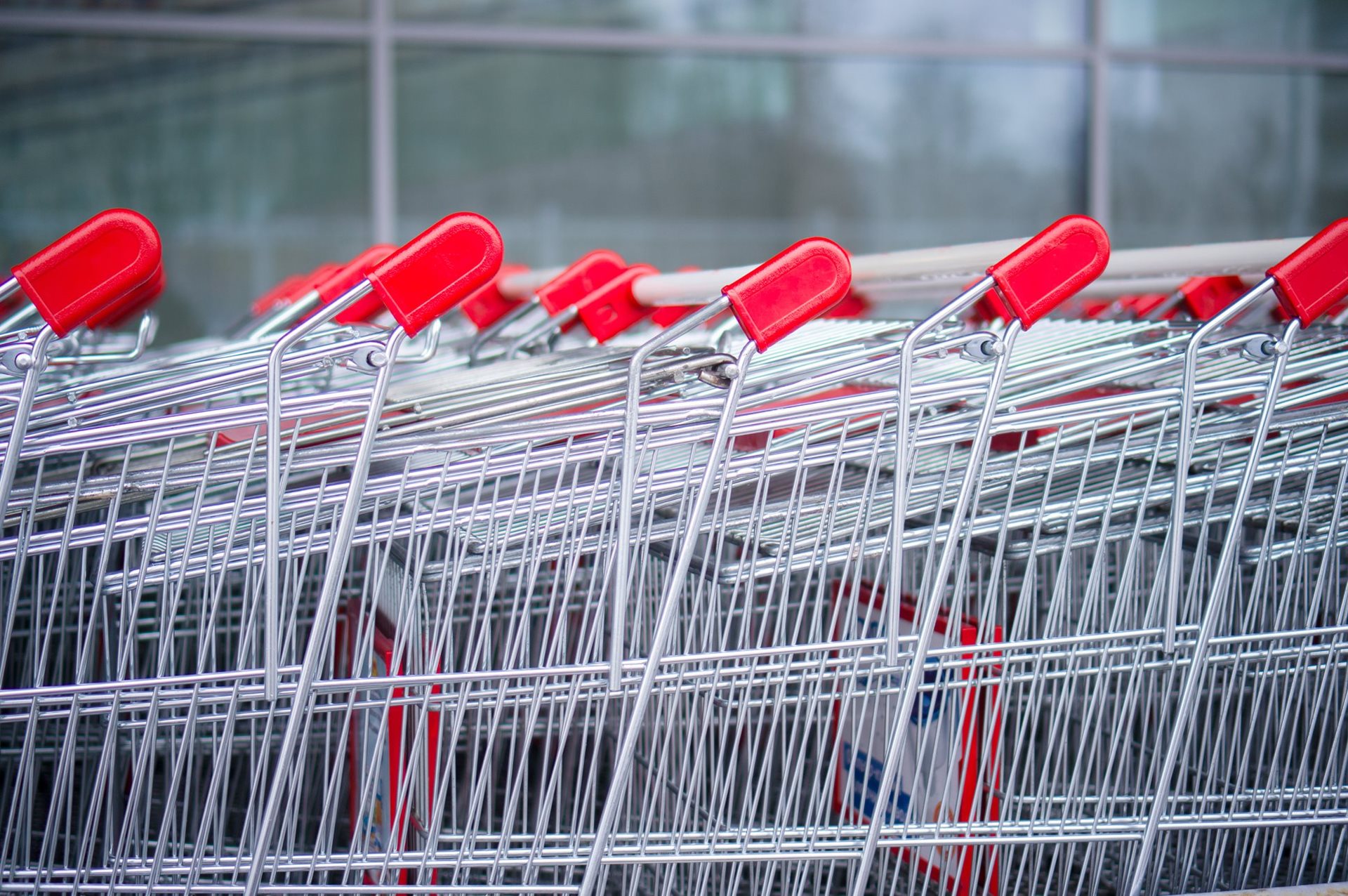 Shopping trolleys stacked together.