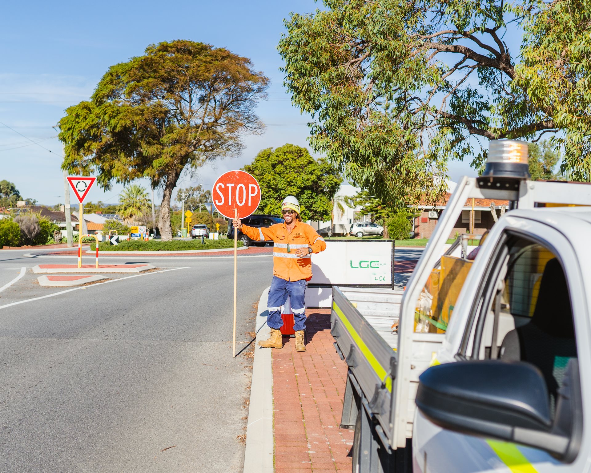 Roadwork sign instructing cars to drive slowly.